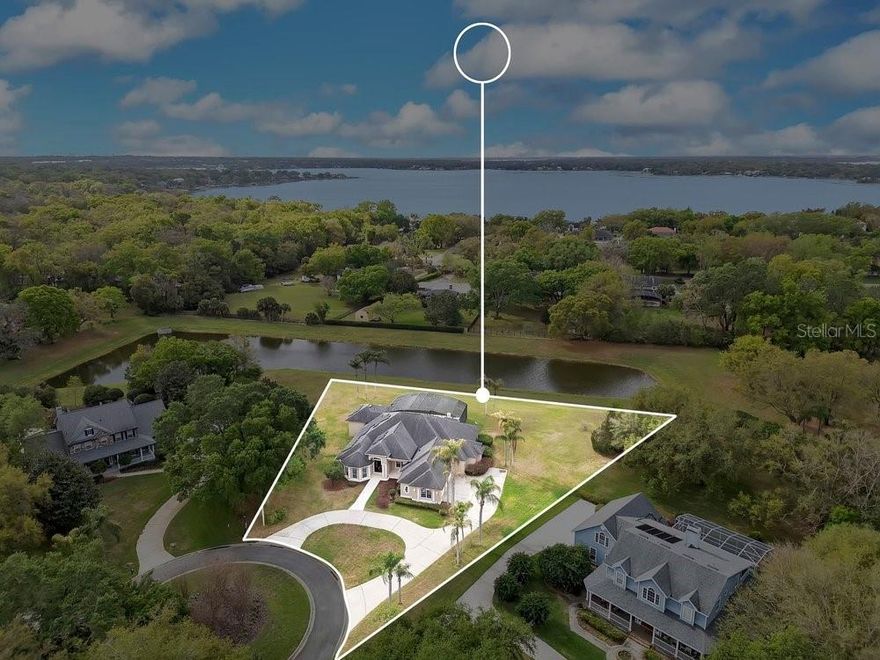 If you need a Separate 1st Floor In-Law Apartment with a Private Entrance overlooking the Screened Pool and Covered Lanai then here it is * Beautifully maintained and updated 5 Bed 4.5 Bath 1 Story Home nestled in one of Windermere’s most desirable Lakefront Communities * This Exceptional Home offers the perfect blend of Comfort, Elegance, and Florida Lifestyle Living * Step inside to discover a bright and open floor plan featuring spacious living areas, high ceilings, and abundant natural light * The gourmet kitchen is a Chef’s dream, complete with modern appliances, ample cabinetry, and a convenient breakfast bar—ideal for entertaining or everyday living * The primary suite provides a peaceful retreat with generous space, a luxurious en-suite bathroom, and a walk-in closet * The Pass Thru from the Primary Suite to the Den with substantial Closets makes the perfect Nursery, Craft Room or Home Office * Additional bedrooms are well-sized and versatile, perfect for family or guests * The Oversized Laundry Room exceeds all expectations * The Massive Covered Lanai provides plenty of space for entertaining in all weather conditions with a backyard the size of a football field * The Conservation Pond out Back feels like you are in the Country even though you are just minutes from every Restaurant, Bank, Hospital, Offices, Retail Store or Mom & Pop Shop that could ever need * Plenty of Biking, Walking & Exercising Opportunities Throughout Windermere * The Neighborhood Park & Boat Ramp to Lake Down & the Famed Butler Chain of Lakes will provide years of family fun * Friday Farmer’s Market & Monthly Food Trucks provide opportunities to meet the wonderful folks in our Community * Easy access to Florida Turnpike, 408, 429 & Interstate 4 make this the perfect place to call home * Solar Electric Panels Provide a Major Savings - Details Available