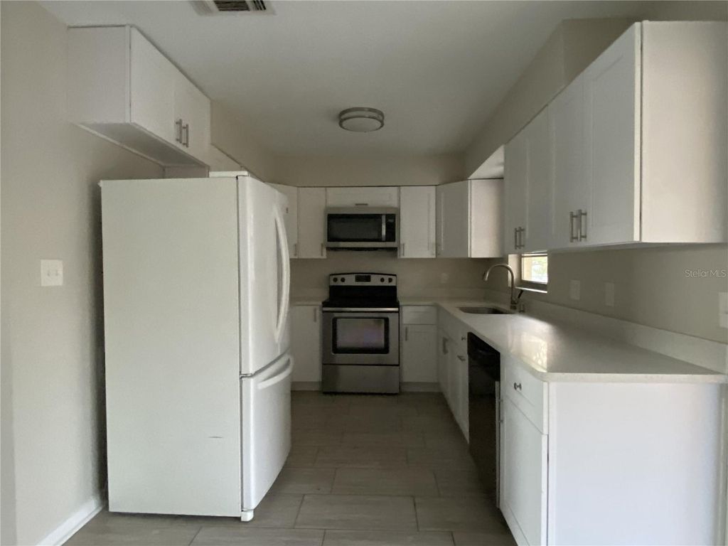 Photo of 7643 Nolton Way, Orlando, FL 32822 (MLS # O6399806)