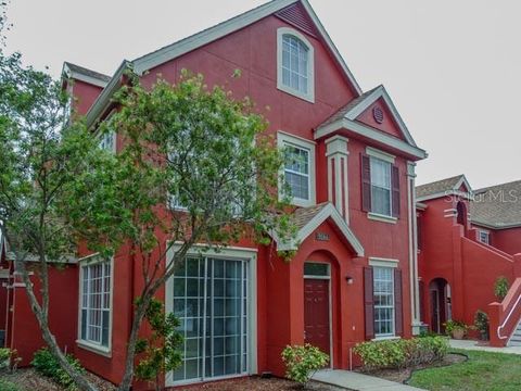 Photo of 9584 Lake Chase Island Way #958, Tampa, FL 33626 (MLS # O6311847)