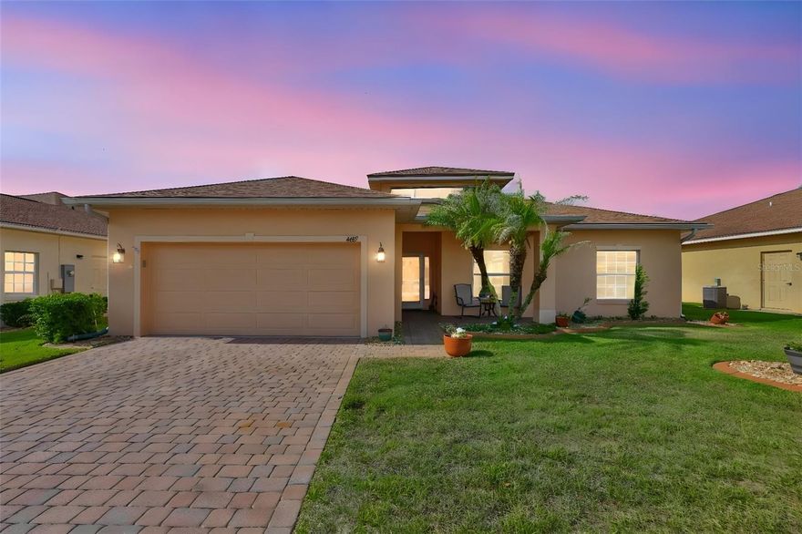 Discover easy Florida living in this beautifully maintained home in Lake Ashton featuring the popular expanded Hemingway floor plan with 2 bedrooms, 2 baths, and a versatile den perfect for a home office, hobby room, or guest space. Best of all, the CDD bond debt is fully paid. Pride of ownership shines throughout, from the landscaping and paver driveway to the move-in ready interior designed for comfort and low-maintenance living.

Step inside to a welcoming foyer and spacious living room with newer carpeting and abundant natural light. The thoughtfully designed kitchen offers 42” Bristol Poplar cabinetry, granite countertops, pull-out drawers, closet pantry, snack bar seating, and updated stainless steel appliances installed in 2020. A sunny breakfast nook overlooks the beautifully landscaped yard, creating the perfect spot for morning coffee.

The private primary suite features a large walk-in closet and an en-suite bath with dual sinks, elevated vanity, tiled walk-in shower, linen closet, and upgraded fixtures. Guests will appreciate the comfortable second bedroom and nearby full bath, while the den provides extra flexibility for overnight visitors or everyday use.

Enjoy year-round relaxation in the spacious bonus room with ceramic tile flooring, ceiling fan, and walls of sliding glass doors bringing the outdoors in. The backyard landscaping creates a peaceful retreat ideal for entertaining or simply enjoying Florida’s beautiful weather.

Additional updates include a NEW ROOF (2022), NEW AC/heat pump (2021), water heater (2019), new exterior paint (2023), upgraded washer and dryer, extra attic insulation, attic fan, rain gutters, insulated dual-pane windows, and more. The attached 2-car garage includes attic storage, service door, and space for a workshop or golf cart parking.

Furniture will convey, offering a potential turnkey opportunity for seasonal or full-time residents. Golf cart available outside of contract. This exceptionally cared-for home is perfect for buyers seeking an active, carefree 55+ lifestyle in sunny Florida.