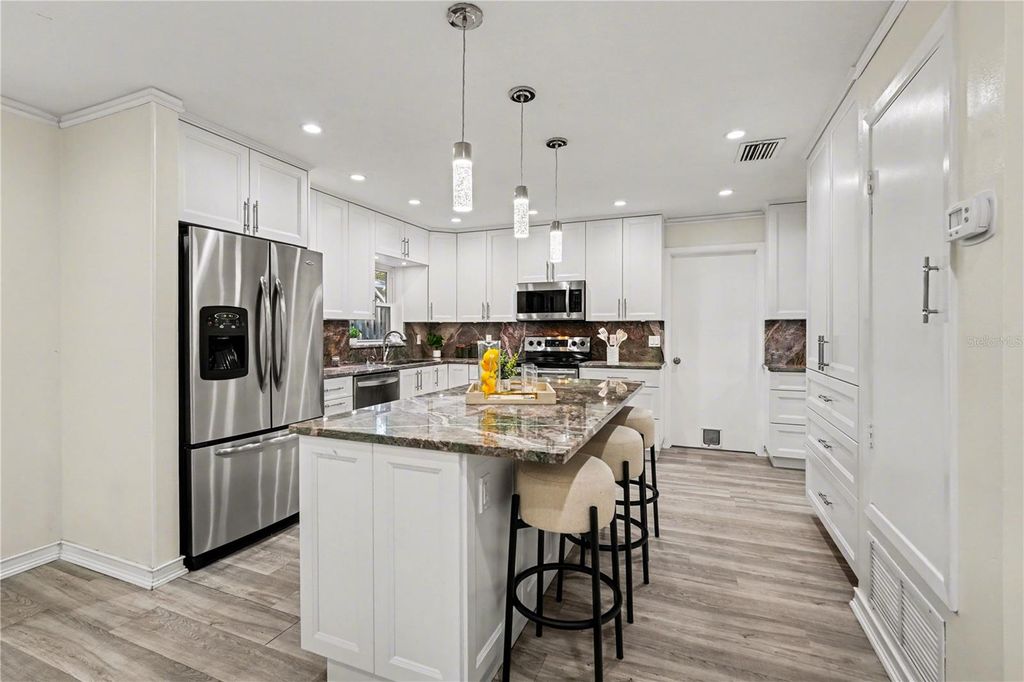 Photo of 1402 Provincetown Circle, Lutz, FL 33549 (MLS # TB8465703)