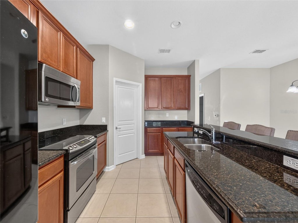 Photo of 7735 Fairgrove Avenue, Windermere, FL 34786 (MLS # O6416769)