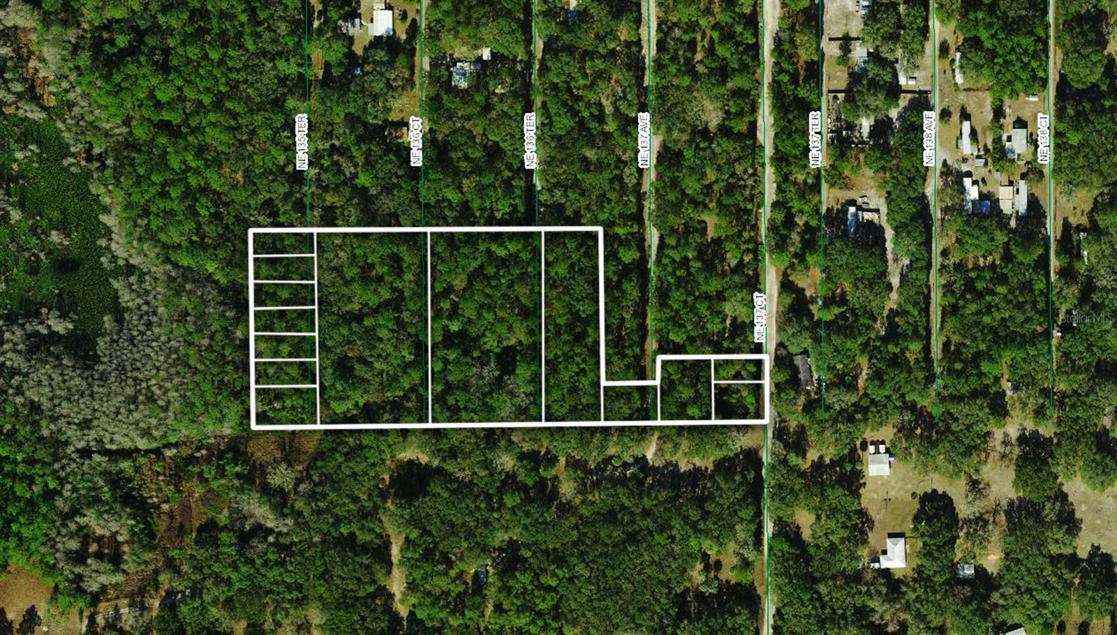 Discover an exceptional opportunity with this collection of buildable parcels totaling 6.66 acres, perfectly positioned near the natural beauty of the Ocala National Forest and the Ocklawaha River. Ideal for investors, builders, or individuals, this quiet countryside setting offers endless potential. Sold together as a package, these consecutive lots provide flexibility to either develop or divide and sell individually in the future. The tranquil location serves as an excellent base for outdoor enthusiasts, with countless recreational activities nearby, from hiking and kayaking to fishing and wildlife exploration. Conveniently located just a scenic drive to both Ocala and Gainesville, you’ll enjoy easy access to a wealth of amenities including diverse shopping, dining, entertainment, and numerous medical facilities. Whether you're seeking a long-term investment or the perfect canvas to bring your dream project to life, these parcels deliver the perfect blend of natural beauty and convenience.