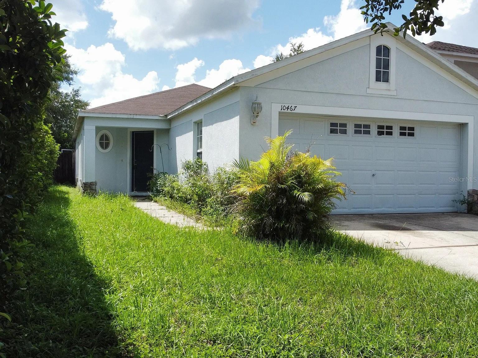 Great location .THREE BEDROOM - walk in closets 2 BATHROOM 2 CAR GARAGE, NEW CARPET ,Pantry in the kitchen COVERED and SCREENED IN LARGE LANAI Fenced yard.
