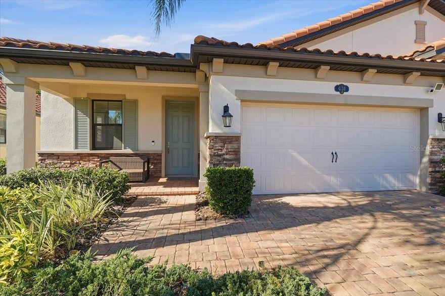 Immaculately maintained 3-bedroom, 2-bath villa with a 2-car garage located in the gated Terra Largo community in Lakeland. The home features a split floor plan with open living and dining areas. The kitchen offers a large center island, granite countertops, wood cabinetry, and stainless appliances.
The primary suite includes a walk-in closet, frameless glass shower, and a granite double-sink vanity. Interior features include upgraded lighting and a dedicated laundry room with utility sink. Exterior highlights include a barrel tile roof, paver driveway and walkway, stone accents, and manicured landscaping.
Lawn care and cable are included. Community amenities include gated access, clubhouse with fitness center, resort-style pool and spa, tennis/basketball court, playground, and walking paths. Convenient to shopping, dining, and major roadways. Partial furnishings may be available if desired.