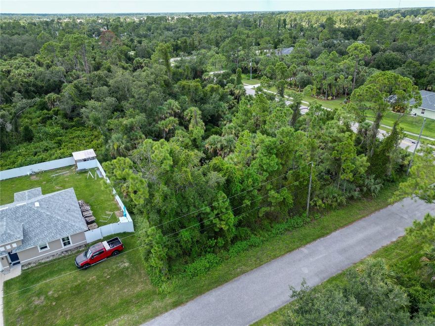 This vacant lot is tucked away in North Port, yet it’s just minutes from I-75, making trips to Sarasota, Venice, Port Charlotte, or even Naples quick and convenient. You’ll also be just a short drive from Wellen Park, a new community full of shops, dining, parks, walking trails, live entertainment, and the Atlanta Braves Spring Training stadium.The City of North Port continues to pop with new homes, schools, and businesses, which makes this the perfect time to secure your piece of land here in Sarasota County. With no HOA restrictions, you’ll enjoy the flexibility of designing your dream home, plus you’re close to Gulf beaches, golf courses, and beautiful nature preserves! Whether you’re dreaming of building your forever home or looking for a smart investment, this location checks all the boxes. And if you’d like assistance on the building process, our trusted custom home builder is available to walk you through every step and answer your questions!
