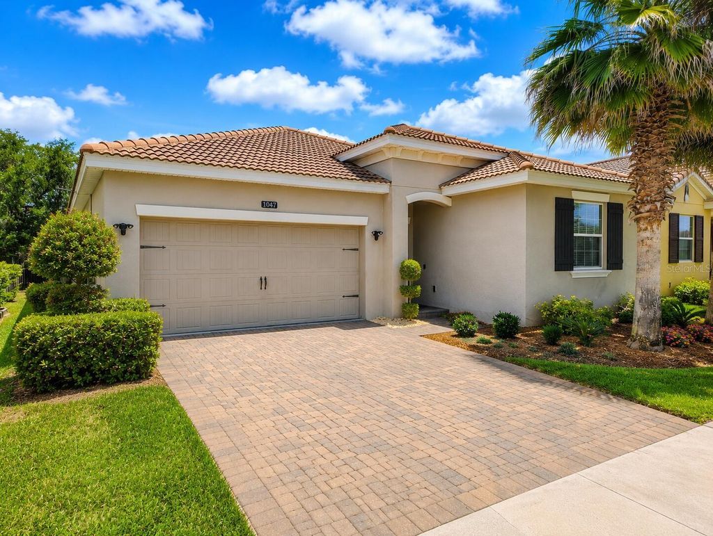 Photo of 1047 Oak Bluff Drive, Davenport, FL 33837 (MLS # O6409756)