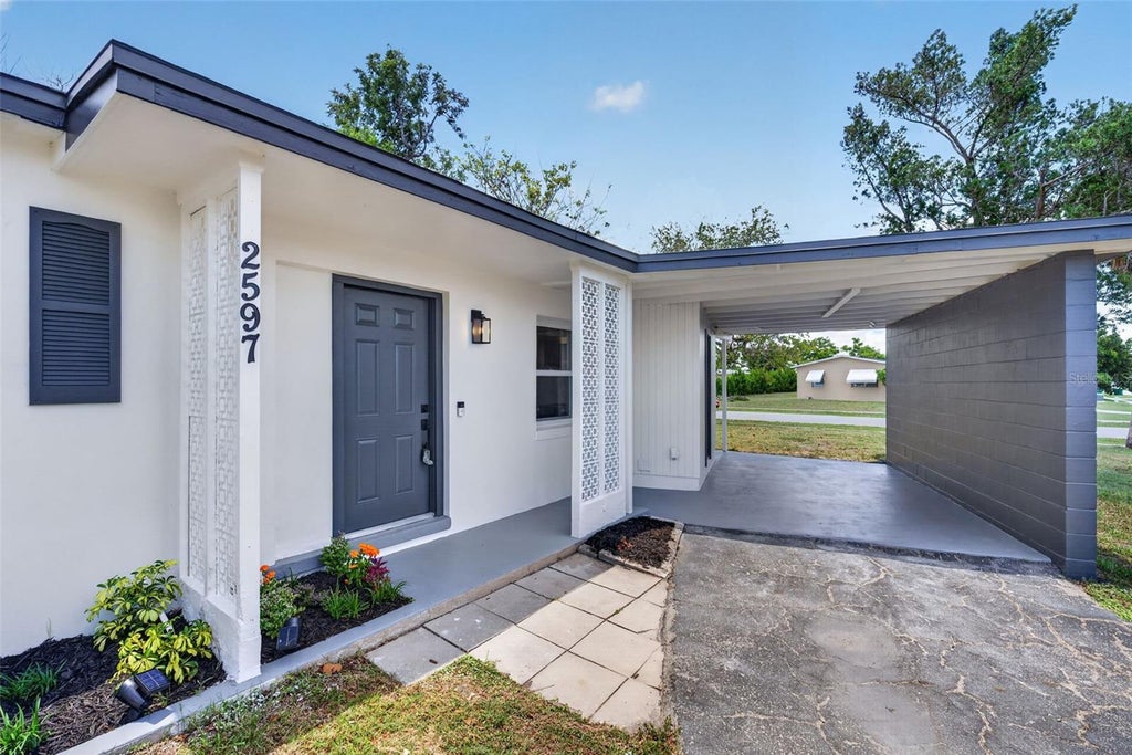 Photo of 2597 Starlite Lane, Port Charlotte, FL 33952 (MLS # O6416377)