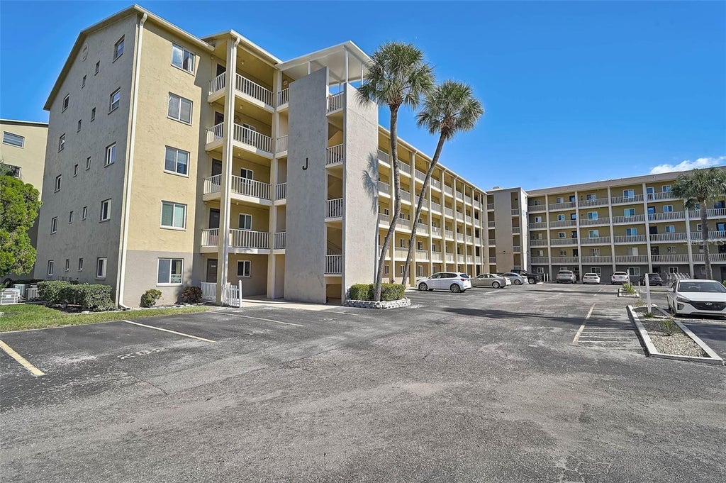 Photo of 3621 Lake Bayshore Drive #J-403, Bradenton, FL 34205 (MLS # A4690941)