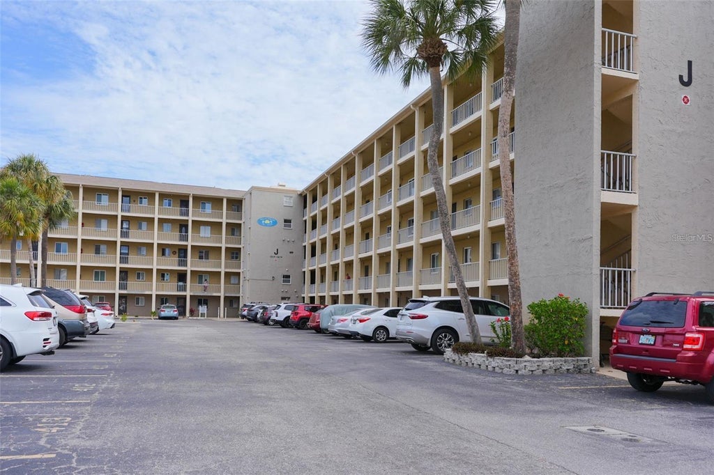 Photo of 3621 Lake Bayshore Drive #J-403, Bradenton, FL 34205 (MLS # A4690941)