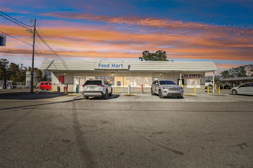 The property at 5110 US Highway 92 W, Plant City, FL, 33563, is a commercial building constructed in 1966, encompassing approximately 3,982 square feet on over 2.4 acres. Currently, it operates as a Deli Food Store, a popular deli and gas station known for its breakfast and lunch offerings. Also on site is an operating tire shop and a barber shop, along with truck storage.