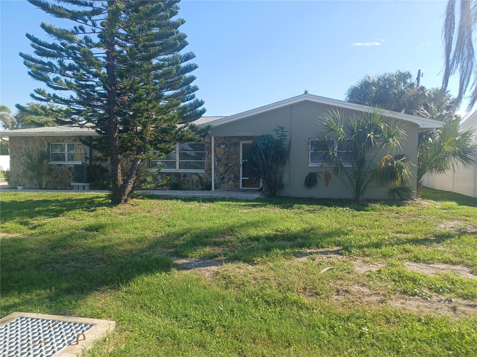 ANNUAL LEASE- LOCATION - LOCATION- LOCATION! Belleair Beach 2 - 3 bedroom/ 2 bath/ 2 car garage. Completely updated after the storm. All new appliances, new cabinets, granite counters. Beautiful remodeled bathrooms. Open floor plan. Florida room can be 3rd bedroom . Oversized garage with washer and dryer laundry area. Screen enclosed porch. Separate outdoor patio. Unfurnished. Small pet considered, with a $250 non refundable pet fee. Close to Belleair Beach City Hall park with tennis courts, basketball court, playground, waterfront access to intercoastal with small beach area. Bring your kayak - one block from the home.