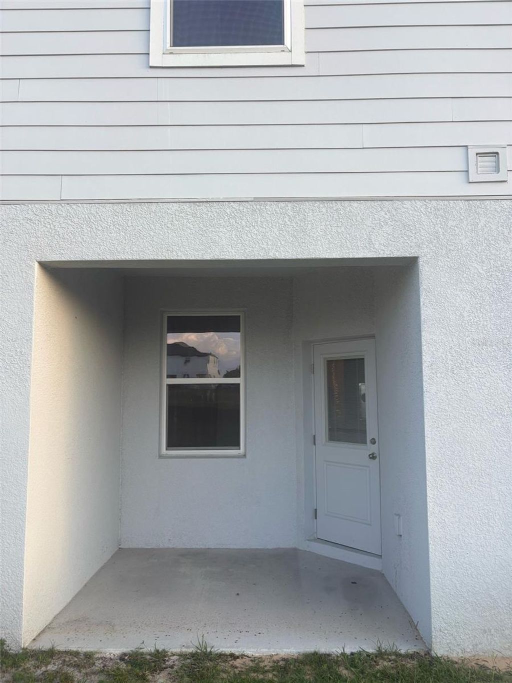 Photo of 872 Poppy Lane #872, Dundee, FL 33838 (MLS # O6398423)