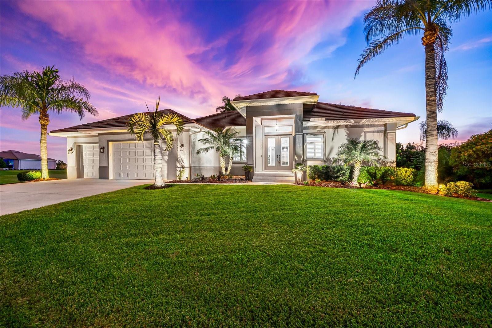 Better than new! Welcome to your dream home in the serene and sought-after community of Burnt Store Lakes, Punta Gorda! This beautifully updated 3-bedroom, 3-bathroom pool home offers 2,225 sq ft of luxurious living space, a 3-car garage, and breathtaking sunset views over the water. This home also includes a separate marketable lot, offering privacy and expansion potential!
Step inside and be captivated by the 12' ceilings, coffer lighting in the great room, and the seamless flow of new porcelain wood-look tile floors throughout. The updated kitchen features quartz countertops, a stylish backsplash, and new stainless steel appliances (2023), perfect for entertaining.
One of the standout features of this home is the 90-degree multi-slide pocket doors, which fully retract to create a seamless transition between the indoor living space and the expansive lanai. This design floods the interior with natural light and offers unobstructed views of the lake and stunning sunsets, perfectly complementing the open-concept layout and Florida lifestyle. Outside, enjoy a brand-new saltwater pool and spa (2024), surrounded by 1,500 sq ft of white limestone pavers and enclosed in a new picture window pool cage. The lanai is vented and prepped for an outdoor kitchen, making it an ideal space for entertaining or relaxing in style.
This meticulously maintained waterfront home has been thoughtfully updated with high-quality finishes and modern conveniences throughout. Recent upgrades include a new roof (2023) and new HVAC system (2022) with a 10-year warranty. The home features new interior and exterior paint, 5” baseboards, and plantation shutters throughout, adding a fresh and elegant touch. The bathrooms were remodeled in 2023 with ceramic tile showers, complemented by new ceiling fans and recessed lighting in all bedrooms.
Outdoor enhancements include a new hot water heater (2025), new pool pump (2025), and a new irrigation pump (2025) with lake water irrigation and expanded zones. The exterior shines with new landscape lighting, coach lights, and rock beds with concrete curbing. Additional features include Storm Smart hurricane shades, accordion shutters on all windows, hurricane rated garage doors with new motors, springs and coils.The garage also features durable, interlocking flooring designed for long-lasting performance and easy maintenance.
About Burnt Store Lakes: Nestled along Charlotte Harbor, Burnt Store Lakes is a peaceful, deed-restricted community known for its natural beauty, kayak-friendly lakes, and proximity to Burnt Store Marina, where you’ll find boating, dining, and golf. Just a short drive to downtown Punta Gorda, enjoy boutique shopping, waterfront dining, and vibrant community events.
Don’t miss this rare opportunity to own a meticulously maintained, move-in-ready waterfront oasis with every upgrade imaginable. Schedule your private showing today and experience the magic of sunset views from your own backyard!