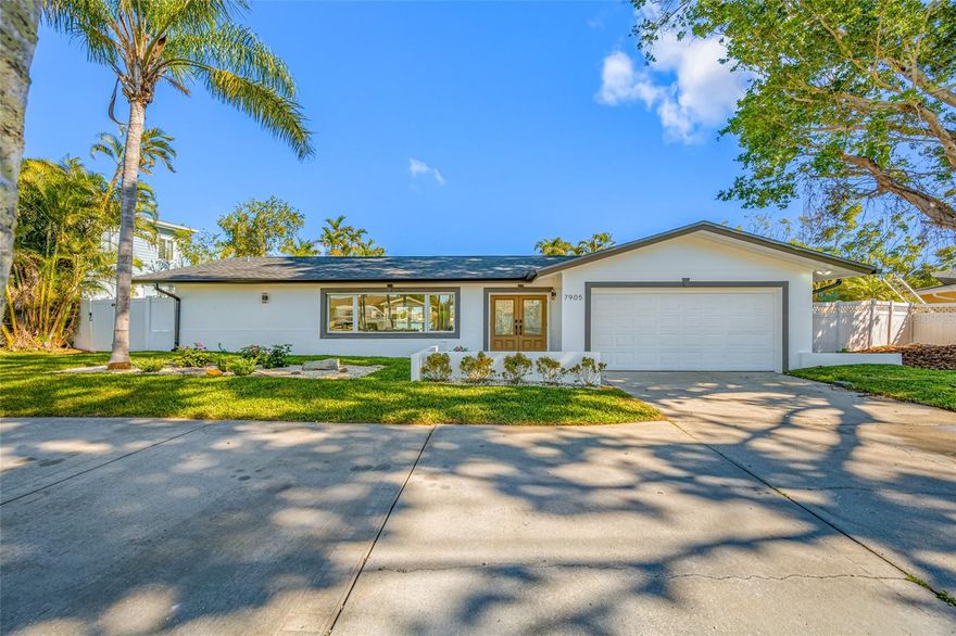 WATERFRONT POOL HOME, PRIME LOCATION Stunning three-bedroom, three-bath waterfront residence, freshly and meticulously remodeled to the highest standard, sits along deep sailboat water in the esteemed South Causeway Isle Yachtclub Estates neighborhood. This thoughtfully redesigned home blends refined luxury with effortless daily living, highlighted by a gorgeous pool and direct water access that invites endless days of boating, swimming, and sunset entertaining.  From the moment you enter, light pours through expansive windows, illuminating the open-concept living spaces crafted for seamless entertaining and quiet, candlelit evenings alike. The centerpiece is a chef’s kitchen finished with granite countertops and a dramatic waterfall island that invites conversation and casual seating for guests gathered around culinary creation. High-end appliances including cooktop, build in oven and microwawe, large fridge, wine fridge etc. and custom cabinetry complement the sleek backsplashes, while the island’s seating accommodates a refined yet inviting gathering spot for intimate meals or social mornings. Dry bar /coffee bar area with extra storage completes the look of the airy and light feel of the dining area.  Three generous bedrooms offer comfort and privacy, each with ample closets and abundant natural light, while the three bathrooms are appointed with modern fixtures and impeccable finishes that elevate everyday routines to a spa-like experience. Large Primary Bedroom with sweeping waterviews and french doors leading to the pool area and the Primary en-suite bath is complete with a large ceramic soaking tub and glass enclosed shower. This bathroom also doubles as the pool bath with direct access to the pool. The interiors are finished in contemporary, timeless tones, with wide ceramic tile flooring throughout and a carefully curated lighting package that enhances every corner of the home. Roof 2024, all mechanicals and fixtures 2025. Large 2 car garage with lots of additional storage space.  Outside, the resort-inspired pool is framed by lush tropical landscaping and inviting outdoor living spaces, perfect for sun-drenched lounging, al fresco dining, and pristine water views everywhere you look. Perfect place to enjoy your morning java or evening cocktail. The property’s direct access to deep sailboat water ensures effortless docking and waterborne adventures, and the Yachtclub Estate setting provides a prestigious, serene ambiance with a neighborly, upscale vibe.

This fully remodeled waterfront sanctuary is move-in ready, combining the best of refined interior spaces with spectacular outdoor living. It’s a rare opportunity to own a home where luxury, craft, and water-front lifestyle converge in perfect harmony. Grab your Golfcart or bike to the gorgeous sugary sand of Treasure Island Beach with lots of unique restaurants and shopping or take the short drive to downtown St Petersburg and enjoy the "beach-city-life". Make your appointment today before its gone.