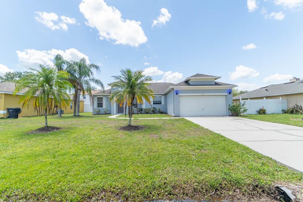 Move-in ready 4 BR / 2 BA ranch tucked on a quiet cul-de-sac in sought-after Poinciana Village 3! Built 2005, the light-filled 1,650 sq ft split plan features vaulted ceilings, an open great-room concept, eat-in kitchen and a private owner’s suite. Enjoy NEWER luxury vinyl plank floors and fresh paint, plus a fully fenced back yard ready for pets or play. Your low $90/mo HOA includes 600 Mbps Spectrum internet, cable TV and full access to two community pools, state-of-the-art Mary Jane Arrington Gym & Aquatic Center, parks, ball fields and miles of nature trails—no CDD! Minutes to Walmart, ALDI, Publix and Poinciana Medical Center with quick Poinciana Pkwy access for an easy Orlando commute. Affordable Florida living with resort-style amenities—schedule your tour today!