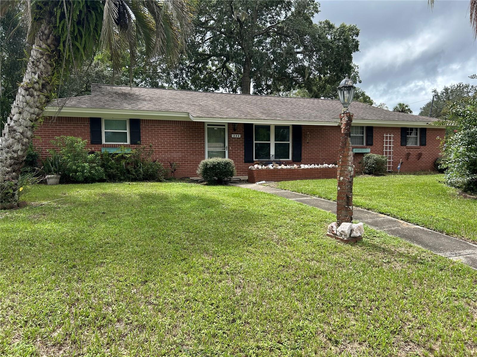 This house has a nice open floor plan. Living room dining room combo creates a large inviting space. The kitchen has new cabinets, granite tops and tile backsplash. The laundry room is large and has a 1/2 bath and could be used as an office. The master bedroom has 2 closets and both bedrooms are large and have big closets. No carpet in the house. The garage has a one car door but is the size of a 2 car garage. All of this sits on a 1/4 acre corner lot. Show this home and you will be suprised with the spacious floor plan.