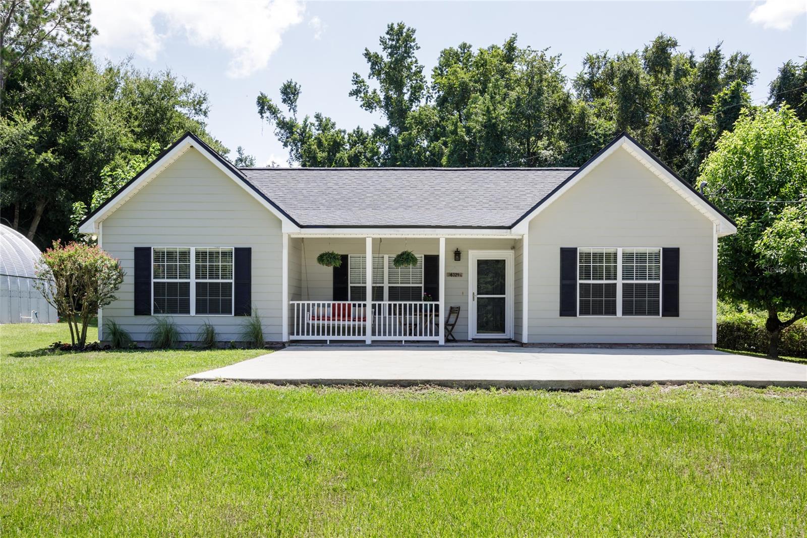Mini-Farm on 2.2 Acres - Just Minutes from Gainesville!
Welcome to your private slice of country living with all the modern comforts! This beautifully maintained 3-bedroom, 2-bath home, built in 2006, sits proudly atop a gentle hill, overlooking a fenced and pastured front yard – perfect for a horse, cow, or goats. The property is fully fenced and cross-fenced, ready for your mini-farm vision to come to life.
Featuring durable Hardie board siding, a brand-new roof, fresh interior and exterior paint, and solar panels for reduced electric bills, this home is move-in ready and energy-efficient. Step out back to a spacious screened porch—ideal for entertaining—while taking in views of the backyard paddock and above-ground pool, perfect for cooling off on hot Florida days.
Need workspace or storage? You'll love the oversized solid metal workshop offering a generous 1,000 sq ft of space—bring your tools, toys, or business ideas! Property is zoned for Automotive Oriented Business (BA) to meet your business needs.
Love the outdoors? The Hawthorne/Gainesville Bike Trail is just steps away, providing miles of scenic riding. With access from both the front and back of the property (positioned between two streets), getting in and out is a breeze. All of this just a short 10-minute drive to Gainesville, giving you the best of both worlds—peaceful country life with city convenience.
Excellent Location!! Great Condition!!! Fantastic Price!!!
Don't miss this rare opportunity—properties like this don’t come around often. Schedule your showing today and discover the lifestyle you’ve been dreaming of!