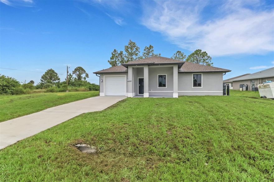 Brand-new 2025 duplex located in the highly desirable southwest area of Lehigh Acres, perfectly situated near Sunshine Blvd, Gunnery Rd, and Lee Blvd, offering easy access to Fort Myers, shopping, dining, and schools. Each side of this beautifully designed property features 3 bedrooms, 2 bathrooms, and a 2-car garage with laundry, showcasing modern finishes, tile flooring throughout, impact-resistant windows, and an open-concept layout that creates a bright and spacious feel. The kitchens are equipped with sleek cabinetry and ample counter space, ideal for both everyday living and entertaining. Built with durable concrete block construction and a stylish stucco exterior, this duplex sits on an oversized 0.30-acre corner lot with separate entrances on each side for added privacy and convenience. Perfect for investors or homeowners looking to live on one side and rent out the other, this new construction property offers exceptional quality, modern design, and strong income potential in one of Lehigh Acres’ most rapidly developing areas.
