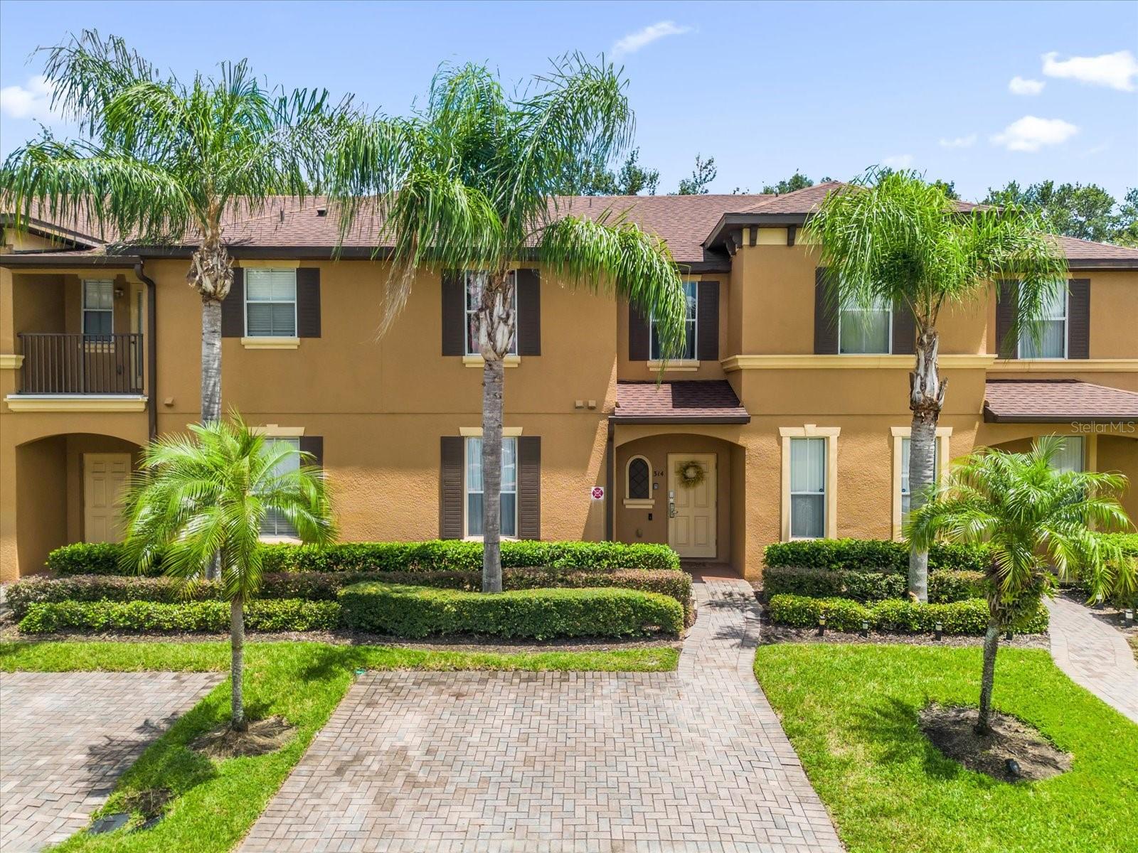 Welcome to your slice of Florida paradise in the sought-after gated community of Regal Palms Resort, just minutes from Disney, theme parks, shopping, dining, and Publix. This fully furnished 4-bedroom, 3-bathroom townhouse offers peace of mind with a new roof, new AC, and a new hot water heater, plus a first-floor bedroom with a private entrance perfect for guests or rental flexibility to use as your own retreat while still generating income. Recent 2024 upgrades include fresh paint, new furniture and mattresses, 6 TV's, modern lighting and ceiling fans, updated cabinet finishes, a new microwave, Keurig, digital locks, and new linens. Regal Palms offers a tropical pool oasis with water slides, a lazy river, and hot tub, along with a full fitness center, health spa, game room, ice cream shop, tiki bar, second BRAND NEW pool and on-site dining, making it a dream destination for vacations or a high-demand short-term rental. Whether you’re escaping Midwest winters, creating unforgettable family memories, or adding a strong investment property to your portfolio, this turnkey home is ready for you to enjoy the Florida lifestyle you’ve been dreaming about.