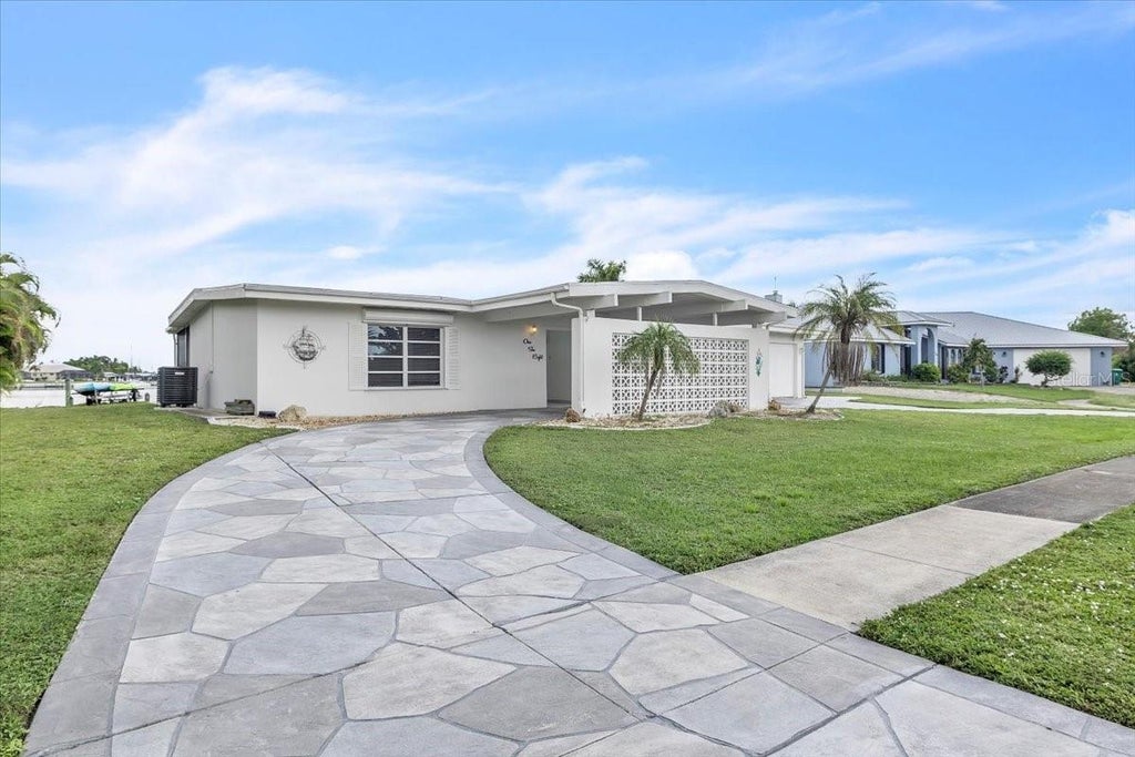 Photo of 168 Morgan Lane SE, Port Charlotte, FL 33952 (MLS # C7531219)