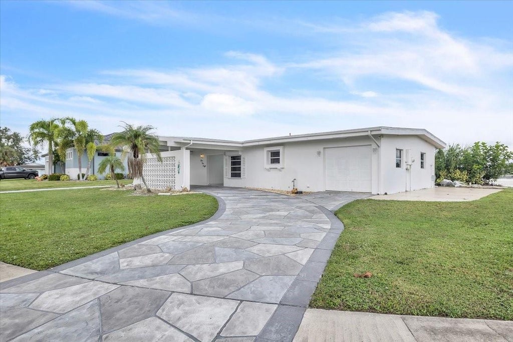 Photo of 168 Morgan Lane SE, Port Charlotte, FL 33952 (MLS # C7531219)