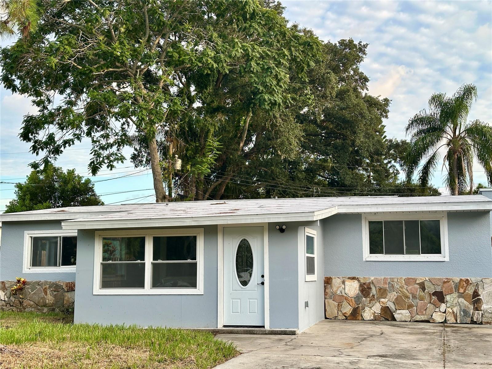 Escape to the charm of New Port Richey in this stunning 3-bedroom, 2-bathroom retreat! This beautifully renovated home boasts a neutral color palette, new paint, newer windows, and brand new blinds, setting the tone for a relaxing atmosphere. The heart of the home is the UPGRADED kitchen, featuring gorgeous granite countertops and stainless steel appliances. The bonus room is perfect for a home office, gym, or playroom - the possibilities are endless! The bathrooms are updated and fresh, with the primary bathroom featuring a relaxing tub/shower combo. Step outside to a fully fenced yard, complete with a storage shed and plenty of space to soak up the Florida sunshine. Plus, enjoy the convenience of an inside laundry room with washer and dryer hookups. Don't miss out on this incredible opportunity to make this house your home!