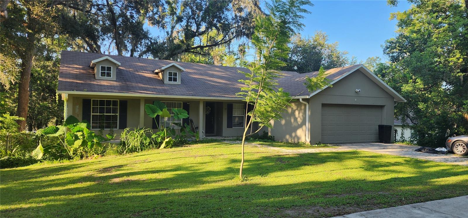 Discover the perfect blend of easy living and classic charm in this exceptional Brooksville home. The open, flowing layout and vaulted ceilings give a grand feel, creating a light and airy atmosphere that is both inviting and modern. This 4-bedroom, 2-bathroom home isn't just a place to live—it's a canvas for your best memories.
Perched on a sprawling .4-acre lot, you'll have all the space you need to live, entertain, and create a personal oasis. The durable laminate and tile flooring throughout ensures a beautiful aesthetic with minimal upkeep.
One of the most valuable features? There are no HOA or CDD fees, giving you the freedom to truly make this property your own. Set in a peaceful and friendly Brooksville neighborhood, you are moments away from excellent schools, local amenities, and easy commutes. This home is more than an address; it's a foundation for a beautiful life.