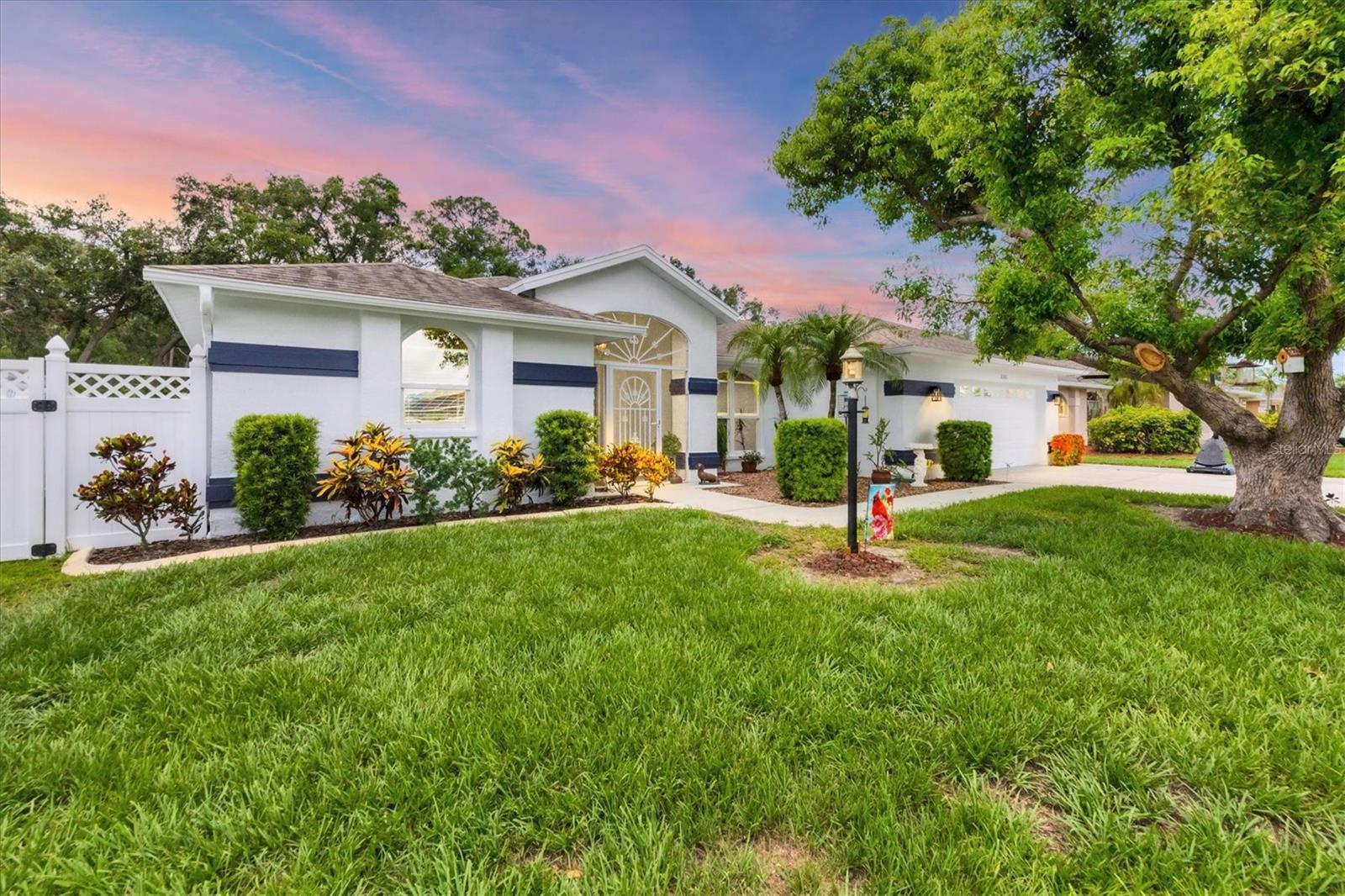 If you are looking for the home that checks all the boxes....look no further! Â This home has been owned by the same owner and shows great attention to detail and has been lovingly maintained. Pride of ownership abounds!! Â The exterior of the home has been power washed, painted and new screens installed on porches and lanai. Â The front entry porch has pavers with a screened sitting area to relax outdoors. Â Open the front doors to a spacious living room with sliders complete with plantation shutters that leads to the rear lanai and pool area. Â To the left is the primary bedroom which also boasts plantation shutters and sliders to let in a lot of natural light! The master bedroom has beautiful views of the pool through the sliders. It also boasts a walk-in closet and the bath has a separate shower and tub with plenty of cabinet storage and linen closet. The Family Room & Kitchen have access to the pool area providing a great flow for entertainment. The Kitchen has been updated with granite countertops and has cozy eating area as well. The living area has been updated with luxury vinyl flooring. Bedrooms 2 & 3 have Hunter Douglas blinds and are located across the house (split floorpan) for everyone's privacy. The shared bath has a shower and also leads out to the pool for easy access. The over-sized laundry room has laundry sink, ample storage, shelving and a closet. Â The large rear lanai is perfect for entertaining and relaxation next to the sparkling salt-water, solar heated pool. Â The backyard has been fenced with white vinyl and chain-link fencing. The over-sized 2 car garage offers shelving and a storage closet. Â This home is located east of 75 in the Paddocks North subdivision. This is located near University Town Center area that has shopping, numerous restaurants and entertainment. You will also find the world class Benderson park with rowing training center and competition pond. It is also the home of the upcoming Mote Marine Aquarium and the Sarasota Circus when they are in town!