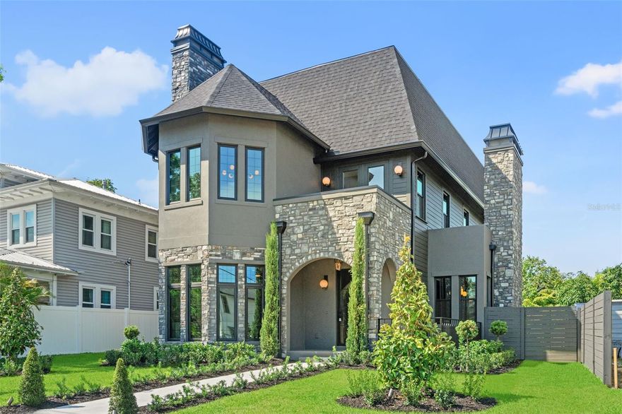 As seen on HGTV's 100 Day Dream Home! Welcome to 807 W Park Ave, a one-of-a-kind residence built by VIKIN Homes in the heart of Ridgewood Park.
**** SELLER OFFERING A 2/1 BUY DOWN at ask OR interest only loan for first 10 years of mortgage. These one of a kind finance specials available through VIKIN HOMES and Home Access Financial.***
Don't miss out on your opportunity for lower payments in Tampa's fastest growing equity neighborhood!
This brand-new, meticulously crafted 5-bedroom, 5.5-bathroom home offers an extraordinary blend of classic design elements and cutting-edge finishes, creating a living experience unlike any other. This stunner boasts five spacious ensuite bedrooms with custom walk-in closets across three floors. Floor one is adorned with mostly common space including your two-toned designer kitchen, dining room, living room, fully built out pantry and built-in mudroom. Floor two is where you go to rest and reset by way of the primary and two separate auxiliary bedrooms. Floor three wraps’ things up by offering more sanctuary with two additional bedrooms and an oversized flex room that hosts ample cabinet and countertop space along with refrigeration. Whether you utilize it as a media room, game room or playroom, its location on the third floor will ensure its occupants aren’t disturbing anyone else in the home. Enjoy panoramic views of downtown Tampa and the Ridgewood Park Butterfly Garden from your private balcony—perfect for morning coffee or evening sunsets. Location is prime being just one block away from the beautiful Hillsborough River and the vibrant Armature Works property, offering access to Tampa's finest dining, shopping, and cultural attractions. This home blends the grandeur and charm of Gothic Revival design with modern, high-end amenities. With its towering spires, arched windows, intricate stonework, and high ceilings, it’s a rare find in the dynamic Ridgewood Park neighborhood. This is more than a home….it’s a lifestyle.
