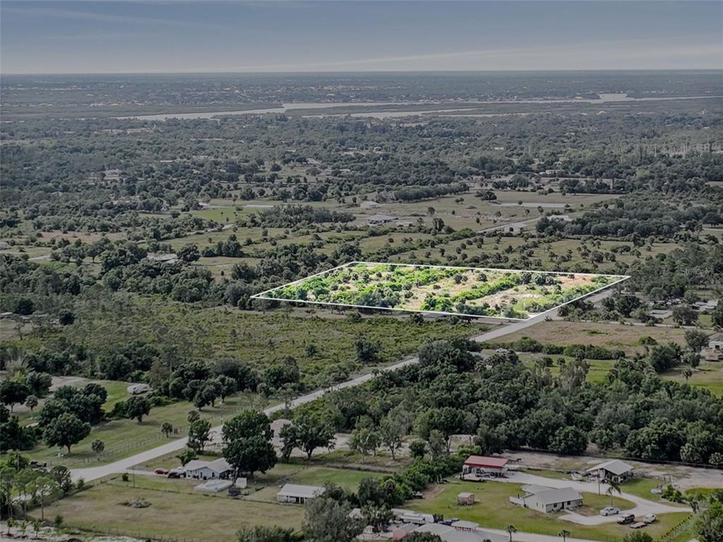 Photo of 6235 Grove Boulevard, Punta Gorda, FL 33982 (MLS # L4944447)