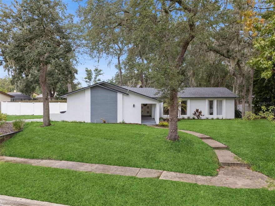 Welcome to this beautifully updated 3-bedroom, 2-bathroom home in the San Sebastian Heights community! Step inside and be greeted by a spacious foyer that opens to a bright and inviting living room featuring luxury vinyl floors and floor-to-ceiling windows that fill the space with natural light. The living area flows seamlessly into the dining room, complete with sliding glass doors that open to the screened patio — perfect for indoor-outdoor entertaining.

At the heart of the home is an open-concept kitchen and family area designed for comfort and connection. The kitchen boasts stainless steel appliances, granite countertops, a decorative tile backsplash, and a breakfast bar with additional seating. The adjoining dinette and family room create the ideal space for gatherings and everyday living.

Enjoy the privacy of the split-bedroom floor plan with the primary suite tucked away for relaxation. The primary bedroom offers a walk-in closet and an updated en-suite bath with a stand-alone shower. On the opposite side of the home, you’ll find two additional bedrooms and a full bathroom with a tub/shower combination.

Sliding glass doors from both the family and dining areas lead to the screened patio overlooking the spacious backyard — a great spot for outdoor dining or simply unwinding. Additional features include a laundry room with washer and dryer and a two-car garage.

Conveniently located close to local amenities, schools, and parks, and with easy access to the highway for commuting or traveling, this home provides a perfect blend of suburban tranquility and modern convenience — so schedule your private showing today!