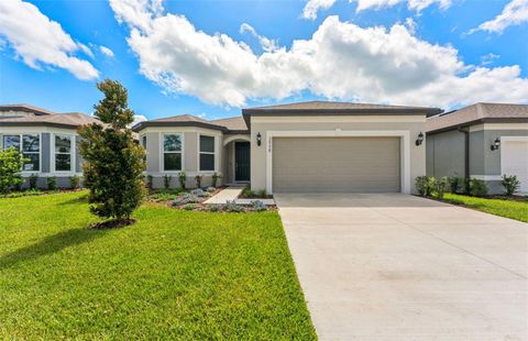 Photo of 3998 Big Sky Drive, Spring Hill, FL 34604 (MLS # TB8400635) Photo of 3998 Big Sky Drive, Spring Hill, FL 34604 (MLS # TB8400635)