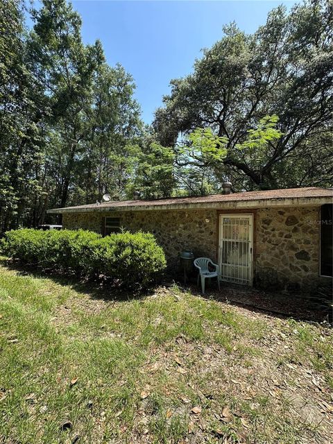 Photo of 15750 NE 150th Terrace, Fort Mccoy, FL 32134 (MLS # GC530983)
