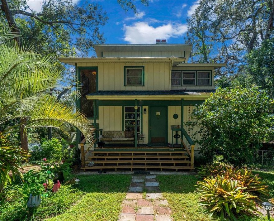 Discover unparalleled lakefront living at this one of a kind tri-level home on the beautiful, clear waters of a spring-fed lake in Ocklawaha! Originally designed  by a Disney artist, this property offers a truly unique lifestyle with breathtaking natural beauty and fantastic amenities. Designed for maximum enjoyment, the home features three separate porches, each providing spectacular views of the sparkling lake. Imagine sipping your morning coffee or unwinding at sunset—this is Olde Florida outdoor living at it's finest. Inside, the distinctive layout provides excellent separation of space and privacy. The star of the show is the HUGE Master Bedroom, an impressive retreat complete with its own private loft space—perfect for a secluded reading nook, home office, or workout area. Storage is never an issue here, thanks to the TONS of closet space built right into the master suite! The ambiance throughout the home is enhanced by two cozy fireplaces, perfect for creating a warm and inviting atmosphere. This versatile floor plan also includes a flexible bonus room, ideal for a home office, media room, or a potential fifth bedroom. The heart of the home is the spacious kitchen, thoughtfully designed with beautiful granite countertops, warm wood cabinets, and a large walk-in pantry. Functionality is key, with a convenient indoor laundry room and abundant storage thoughtfully integrated throughout the entire home.
Beyond its appeal as a personal oasis, this property holds significant income-producing potential. The unique layout, waterfront location, and flexible space make it an ideal candidate for short-term rentals (AirBnB/VRBO), a long-term rental, or a multi-generational living arrangement—offering a fantastic opportunity to offset your mortgage or generate new revenue.