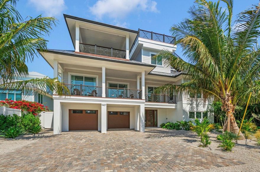 Located on picturesque Anna Maria Island, this exceptional 9-bedroom, 8.5-bathroom coastal retreat offers 4,244 sq ft of heated living space with luxurious amenities throughout. The open-concept interior features an oversized kitchen with a spacious quartz island, upgraded appliances, and a wet bar for entertaining. Enjoy the multiple balconies or the rooftop deck, showcasing Gulf of Mexico views and unforgettable sunsets. Just a 3 MINUTE WALK TO THE BEACH! The private backyard oasis includes a custom styled pool with a hot tub, a game area, and plenty of space for lounging. The primary suite, located on the third floor, includes a king bed, private balcony, and a spa-like ensuite with an enclosed shower and tub. 5 additional king bedrooms feature ensuite bathrooms, some with balcony access, while 2 king bedrooms share a hallway bathroom. The ninth bedroom offers a full-over-full bunk bed and an ensuite bath. ALL FURNISHINGS INCLUDED. Additional highlights include an elevator, game room, and parking for up to FIVE cars. This ideal beach retreat combines modern elegance with relaxed island charm- GREAT RENTAL OPPORTUNITY.