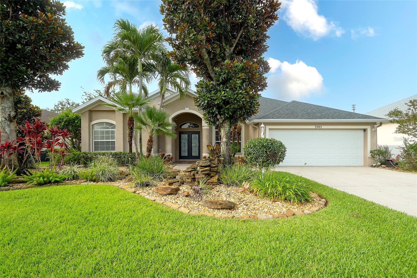 A touch of southern living nestled in peaceful and growing Ellenton. This spacious 3-bedroom, 2-bathroom home with a pool and beautiful mature landscaping is located on a quiet street on an almost quarter acre lot. The home's interior was recently painted and boasts a single-story design, with high ceilings, plenty of natural light, formal sitting room, a spacious living room with sliders that lead to a large screened in lanai with pool, formal dining area, and master bedroom suite. Master bathroom has a double vanity, water closet, garden tub, and separate shower. Kitchen has stainless appliances, granite countertops, with room to eat at the counter or in the breakfast nook that looks over the pool. The subdivision of Oakley is located near the Ellenton Prime Outlets and I-75 giving you quick access to shopping, dining, and entertainment in Bradenton, Lakewood Ranch, Sarasota, Brandon, and the beaches on Anna Maria Island and Longboat Key.