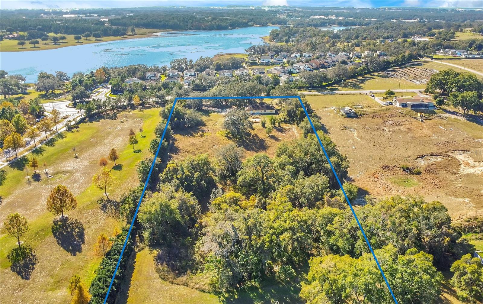 LAKE AVALON GROVES REP - Land