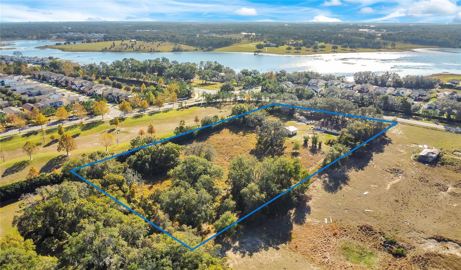 LAKE AVALON GROVES REP - Land