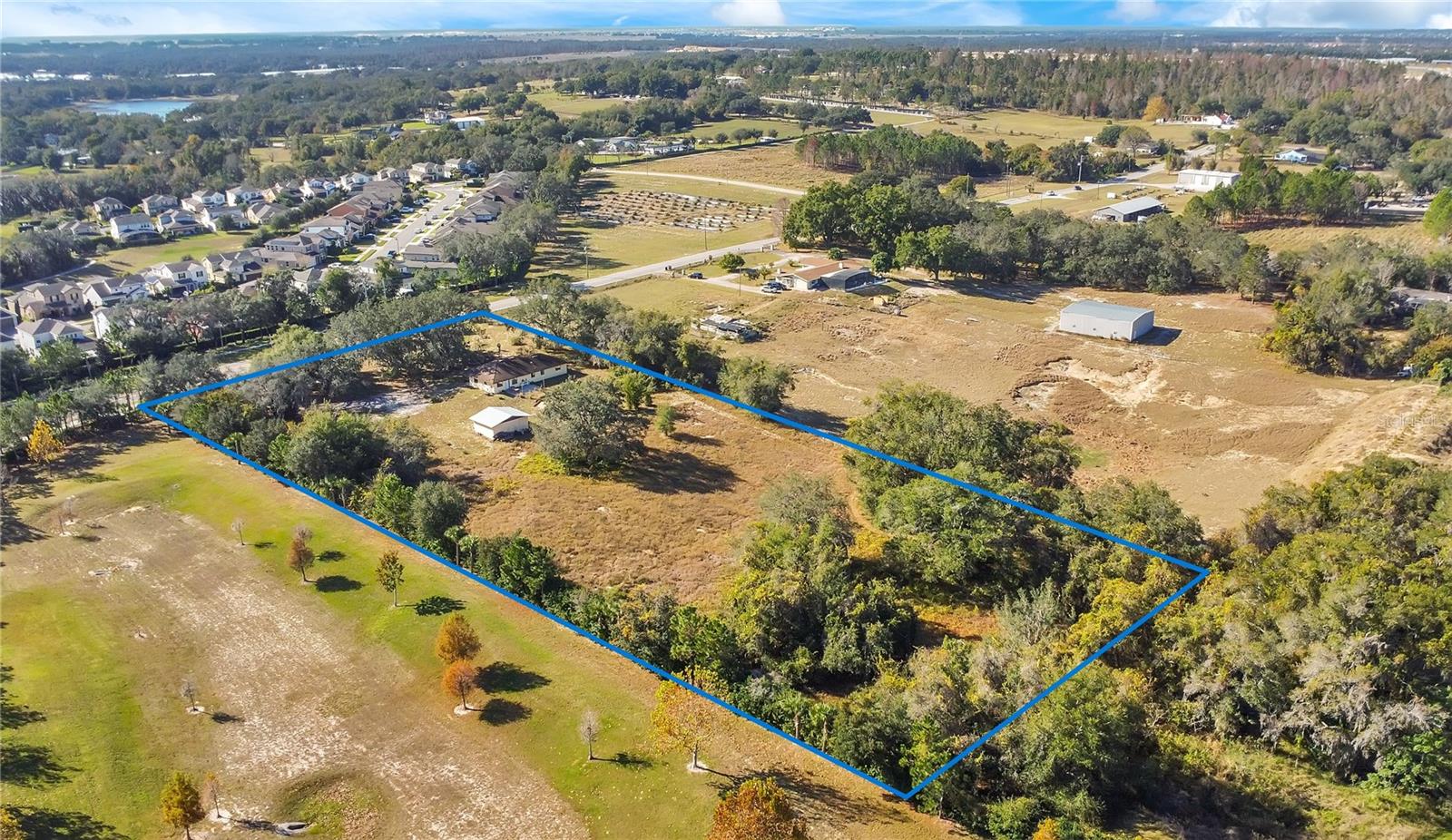 LAKE AVALON GROVES REP - Land