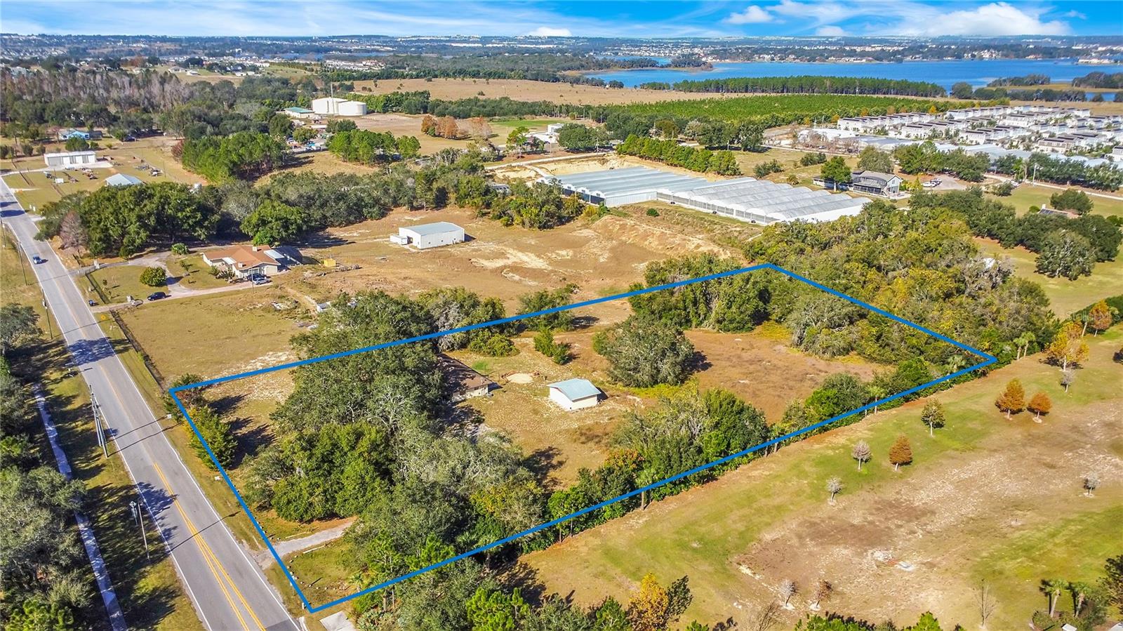 LAKE AVALON GROVES REP - Land