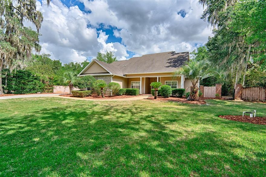 $18,000 Roofing Credit with acceptable offer.  Charming 3BR/2.5BA pool home on a beautifully landscaped 1-acre lot in desirable Oakleigh, just minutes from Tioga Town Center. Open kitchen with solid wood cabinetry, granite countertops, stainless steel appliances, and ample counter space overlooks the expanded family room with French doors to an expansive outdoor living area. Features include high ceilings, crown molding, tile and wood flooring in the main living areas and primary suite. Enjoy custom brick pavers, a saltwater pool, and a private backyard with tropical landscaping, oaks, and bamboo. Convenient to shopping, dining, I-75, Newberry Rd, Archer Rd, UF, Shands, VA, HCA, and top-rated schools.  This is your opportunity to be on 1 acre in SW Gainesville, come and see it today.
