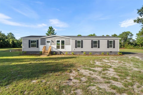Photo of 12610 SE 115 Street, Ocklawaha, FL 32179 (MLS # GC542987)