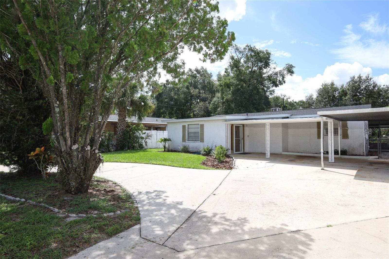 Tucked away on a quiet dead-end street with no HOA, this home blends privacy, comfort, and convenience. A new roof (2 years old) and an upgraded electrical panel meeting current code bring peace of mind, while central heat and air keep every season comfortable. The heart of the home is the updated kitchen, designed for both everyday living and entertaining. A spacious island counter, recent cabinets with ample storage, and elegant marble countertops create a true chef’s space, complemented by a large pantry and modern appliances—stove, refrigerator with ice maker, microwave, and dishwasher. Natural light streams through large front and back windows, brightening the living spaces, while the fireplace adds warmth and charm. The master suite features its own full bathroom, and each bedroom has its own window for an airy feel. Convenience continues with an indoor laundry room, two storage closets, and a built-in alarm system. Outside, enjoy the ease of a circular driveway, the privacy of a wall and chain-link fencing, and a covered, screened-in patio ideal for year-round relaxation.
Location couldn’t be better—just minutes from Florida Hospital, Altamonte Springs Mall, I-4, shopping, dining, and healthcare. Add in top-rated Seminole County schools, and you’ll see why this home isn’t just a place to live—it’s the lifestyle you’ve been waiting for.