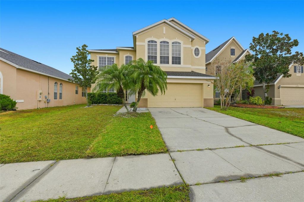 Photo of 2061 Cedar Park Lane, Orlando, FL 32824 (MLS # O6363095)