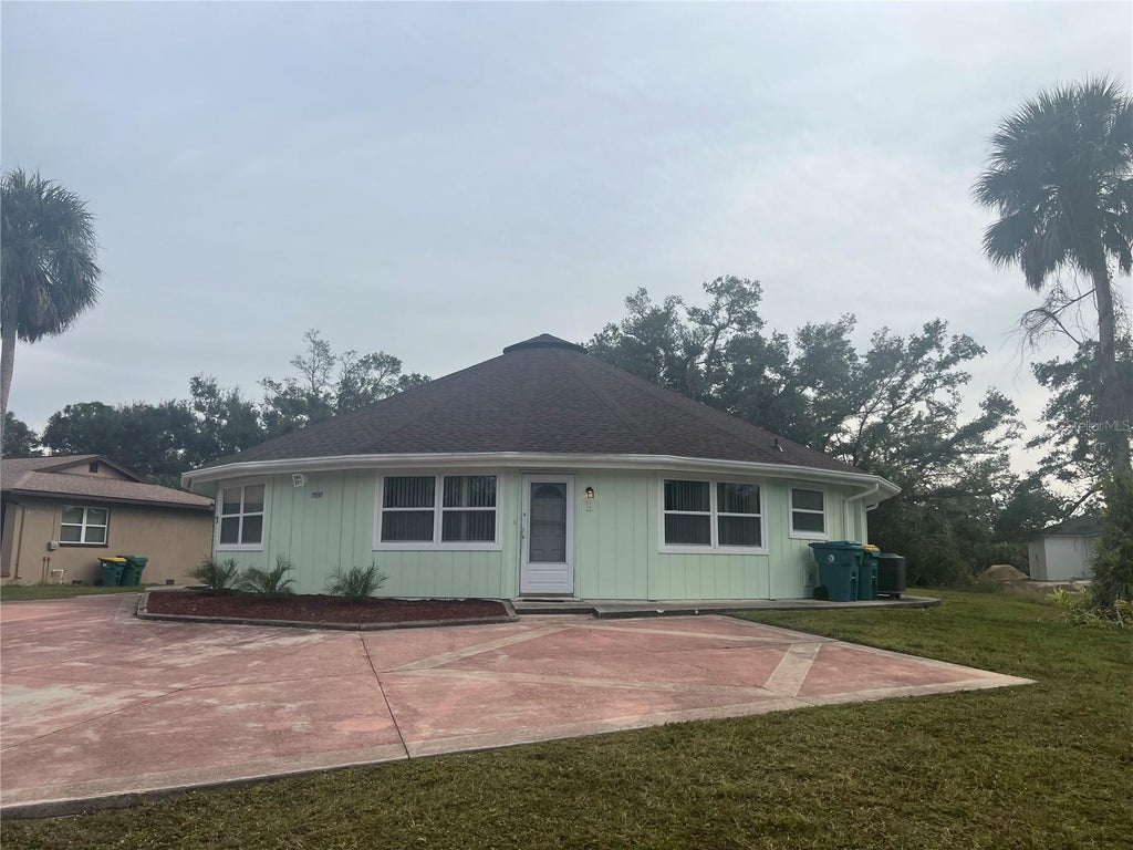 Photo of 15539 Chamberlain Boulevard, Port Charlotte, FL 33953 (MLS # TB8524460)