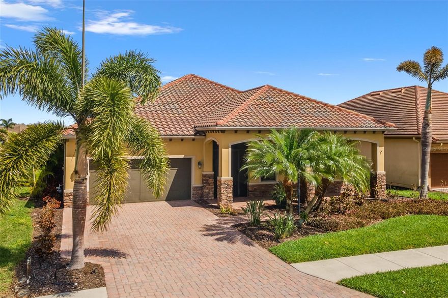 NEW PRICE – MOVE-IN READY LAKEFRONT POOL HOME IN GATED GOLF & TENNIS COMMUNITY in the Lakewood Ranch area!

Skip the wait and cost of new construction with this highly upgraded Siesta floor plan offering 3 bedrooms, 2.5 baths, plus a flexible den/office in the sought-after Rosedale Golf & Tennis Country Club. Designed for comfort, style, and peace of mind, the home features impact-resistant windows and doors for easy storm protection.

The open-concept great room is perfect for entertaining, showcasing a custom stone accent wall with built-in cabinetry and fireplace, coffered ceilings, crown molding, and wood-look tile flooring for a sophisticated yet relaxed Florida lifestyle.

The gourmet chef’s kitchen features an extended island, espresso wood cabinetry, granite countertops, designer tile backsplash, stainless steel appliances, double wall ovens, gas cooktop, and spacious walk-in pantry—ideal for everyday living and entertaining guests.

Enjoy true Florida indoor-outdoor living with a private lakefront backyard featuring a solar-heated saltwater pool and spa. The fully equipped outdoor kitchen includes a Blackstone grill, sink, refrigerator, and polymer cabinetry, while electronic hurricane screens enclose the covered lanai for added convenience and protection.

The luxury primary suite offers a spa-style bath with free-standing soaking tub, oversized Roman walk-in shower, and large walk-in closet. Two guest bedrooms share a Jack-and-Jill bath, while the den/flex space is perfect for a home office, media room, or hobby space.

Additional upgrades include NEW 2026 A/C, brand new washer and dryer with expanded laundry room, extended garage with epoxy flooring, upgraded landscape lighting, paver driveway, screened front entry, and beautiful curb appeal.

Residents enjoy resort-style amenities at Rosedale Golf & Tennis Country Club, including tennis, bocce, fitness center with classes, junior Olympic pool, 22,000-sq-ft clubhouse, full-service restaurant, and year-round social events. Optional golf memberships available.

The HOA includes lawn maintenance, cable, high-speed internet, two 24/7 manned gates, and dog parks, with NO CDD fees.

Located just minutes from I-75, UTC Mall, Sarasota-Bradenton International Airport, top-rated medical facilities, dining, and the world-famous Gulf Coast beaches.

Schedule your private showing today and experience the Rosedale lifestyle.