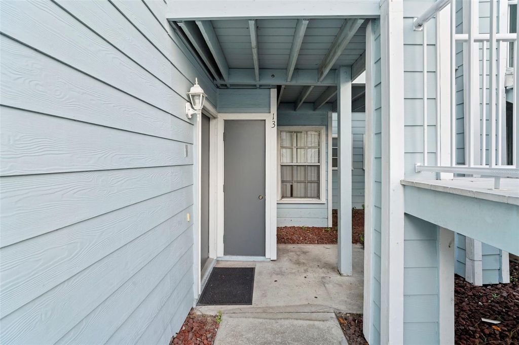 Photo of 2051 Royal Bay Boulevard #13, Kissimmee, FL 34746 (MLS # O6374499)