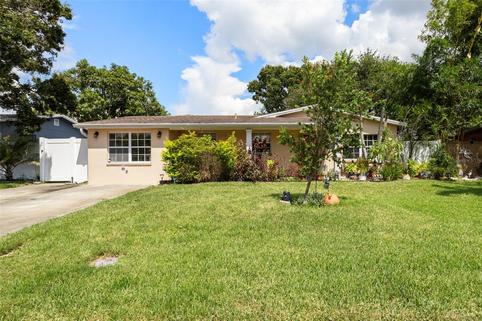 Welcome to this charming 3-bedroom, 2-bathroom single-family home in Pinellas Park. Situated in a non-flood zone with no HOA, this property offers peace of mind and freedom from extra fees or restrictions. Inside, you’ll find waterproof high-traffic laminate flooring through most of the home, along with a spacious kitchen featuring granite countertops, stainless steel appliances, and plenty of cabinet space—perfect for everyday cooking and entertaining. The open layout creates a comfortable flow between the living and dining areas, while the bedrooms provide ample space for relaxation. Step outside to enjoy a fully fenced backyard, offering the feel of country-style space with the convenience of city living. Just minutes from shopping, dining, major highways, and Florida’s beautiful Gulf beaches, this move-in ready home combines comfort, location, and lifestyle all in one