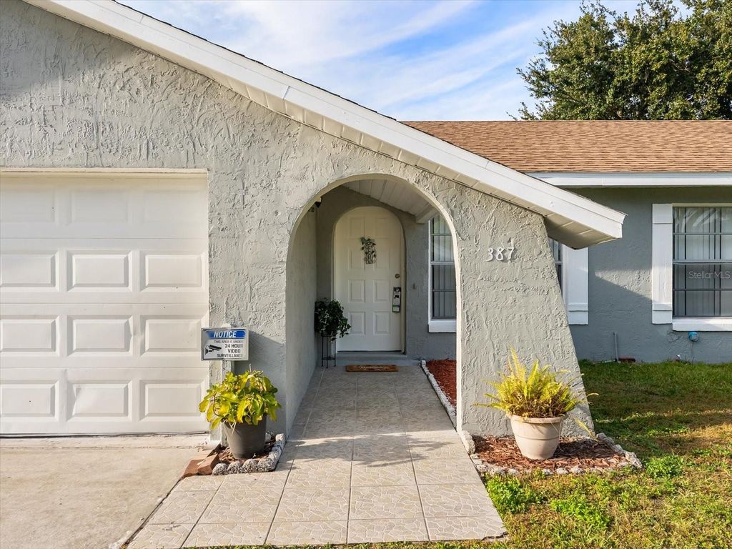 Photo of 387 Iowa Woods Circle W, Orlando, FL 32824 (MLS # O6362722)